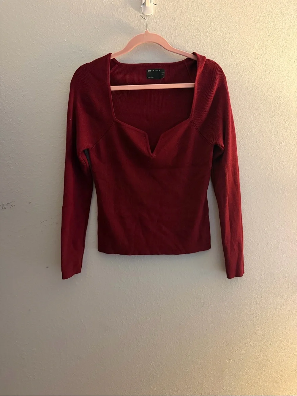 ASOS DESIGN Ribbed knitted top with plunge notch neck in Deep Wine Red